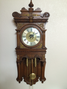 Restored Vienna regulator wall clock with a white enamel dial and twin brass weights