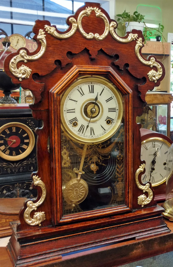 A restored antique parlor clock on display in the Gesswein's showroom